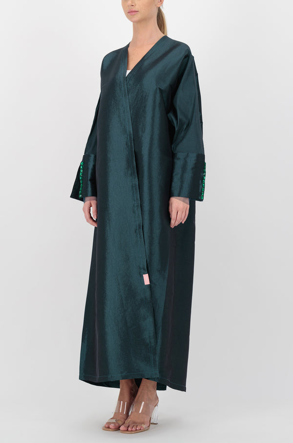 Emerald silk taffeta abaya with embellishments